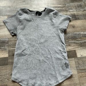 The size is large. The colour is a light grey.